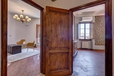 Area soggiorno di Palestro Apartment by Mamo Florence