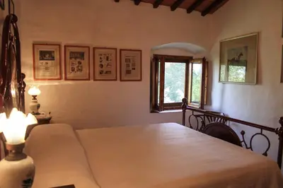 Letto o letti in una camera di Villa Collegalle