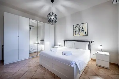 Letto o letti in una camera di YD Garella