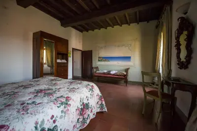 Letto o letti in una camera di Borgo Ponte dell'Asse