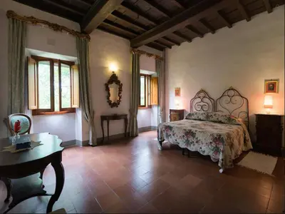 Letto o letti in una camera di Borgo Ponte dell'Asse