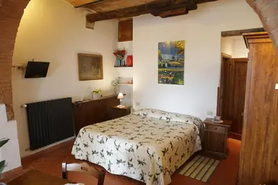 Letto o letti in una camera di Agriturismo Bruscola