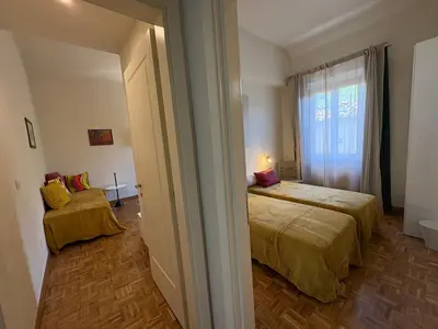 Letto o letti in una camera di Torre Carolina