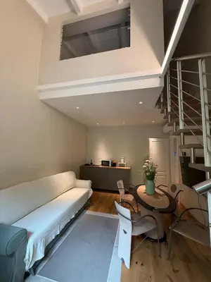 Letto o letti in una camera di Casa Cialdini 14
