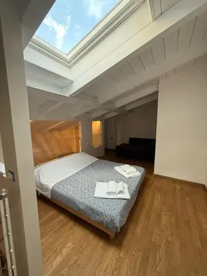 Letto o letti in una camera di Casa Cialdini 14