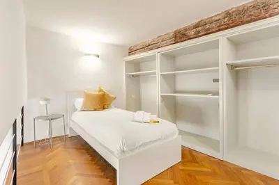 Letto o letti in una camera di Palazzo Bartolommei centralissimo Ponte Vecchio Uffizi