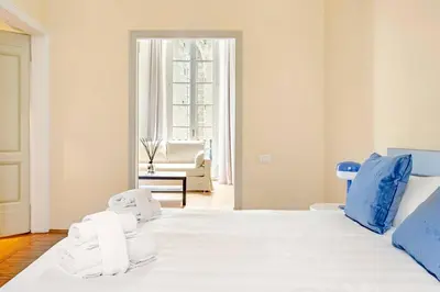 Letto o letti in una camera di Palazzo Bartolommei centralissimo Ponte Vecchio Uffizi