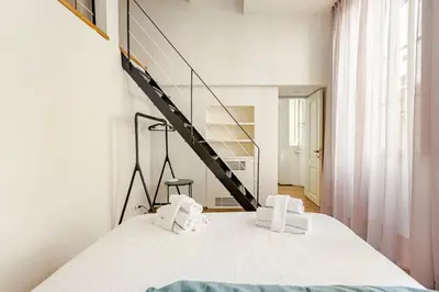 Letto o letti in una camera di Palazzo Bartolommei centralissimo Ponte Vecchio Uffizi