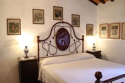 Letto o letti in una camera di Villa Collegalle