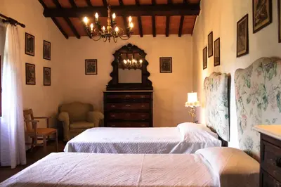Letto o letti in una camera di Villa Collegalle