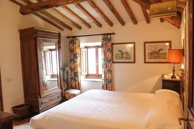 Letto o letti in una camera di Villa Collegalle