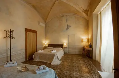 Letto o letti in una camera di Studio Bargello