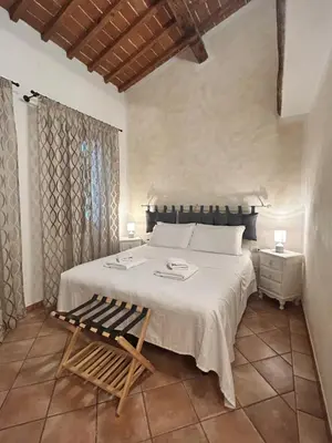 Letto o letti in una camera di Palazzo Vecchio Flat with AC
