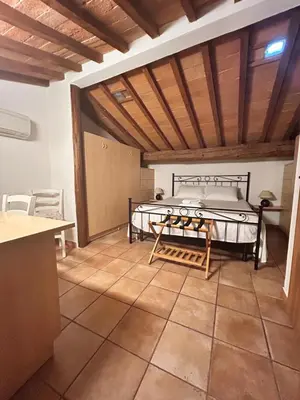 Letto o letti in una camera di Palazzo Vecchio Flat with AC
