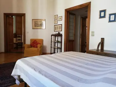 Letto o letti in una camera di The Suite Dome Apartment by Mamo Florence