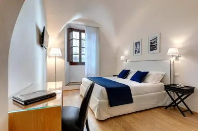 Letto o letti in una camera di B&B Dell'Olio