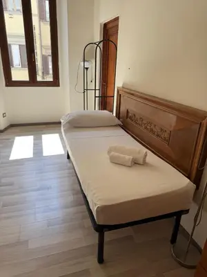 Letto o letti in una camera di Il Pellegrino Guesthouse