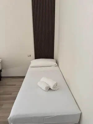 Letto o letti in una camera di Il Pellegrino Guesthouse