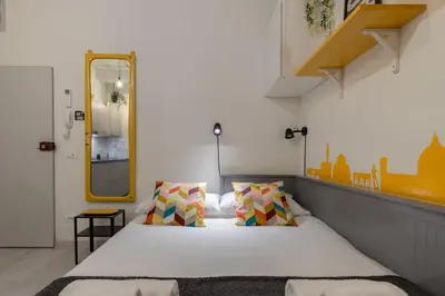 Letto o letti in una camera di The Court of Santo Spirito