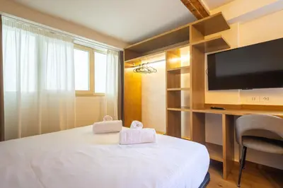 Letto o letti in una camera di Ars Nova Apartments