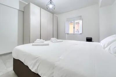 Letto o letti in una camera di Calimaruzza Boutique Apartment