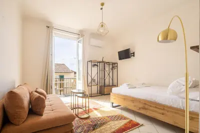 Letto o letti in una camera di Capo di Mondo Apartment