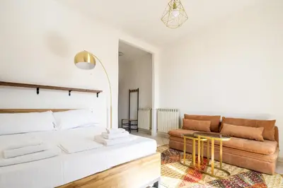 Letto o letti in una camera di Capo di Mondo Apartment