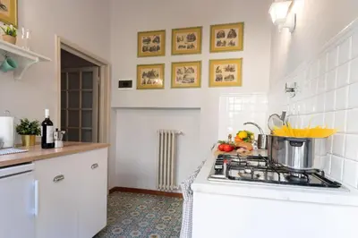 Cucina o angolo cottura di Suite Charming San Marco 4 posti letto