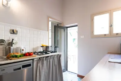 Cucina o angolo cottura di Suite Charming San Marco 4 posti letto