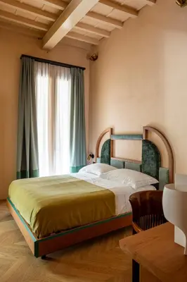 Letto o letti in una camera di The Wheels Florence