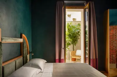 Letto o letti in una camera di The Wheels Florence