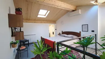 Letto o letti in una camera di La casa di E