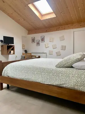 Letto o letti in una camera di La casa di E