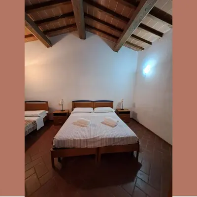 Letto o letti in una camera di Agriturismo Fattoria Loppiano 4-0