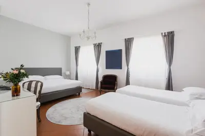Letto o letti in una camera di The Artists' Palace Florence