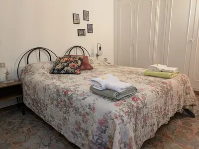 Letto o letti in una camera di Corte della rosa