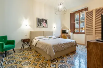 Letto o letti in una camera di Charming Vico