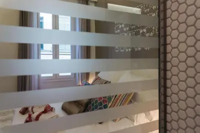 Letto o letti in una camera di Rose Apartment - Santo Spirito district