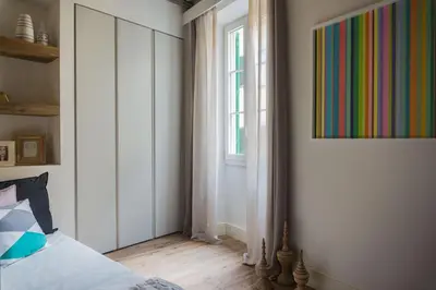 Letto o letti in una camera di Rose Apartment - Santo Spirito district