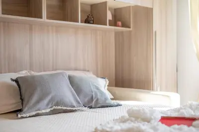 Letto o letti in una camera di Urban Nest at Leopolda & Fortezza
