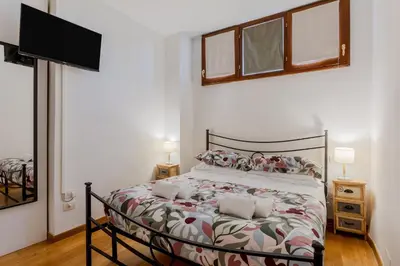 Letto o letti in una camera di GuestHost - Novoli Escape in Florence with Parking