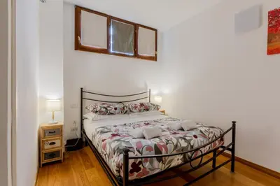 Letto o letti in una camera di GuestHost - Novoli Escape in Florence with Parking