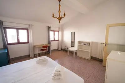 Letto o letti in una camera di Rustic flat by Ponte Vecchio