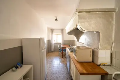Cucina o angolo cottura di Rustic flat by Ponte Vecchio