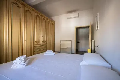 Letto o letti in una camera di Rustic flat by Ponte Vecchio