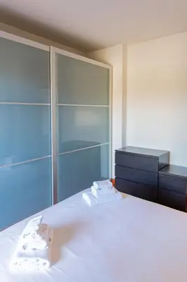 Letto o letti in una camera di Tranquil & Modern Apartment outside ZTL