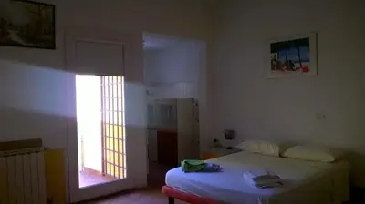 Letto o letti in una camera di Colonna Home