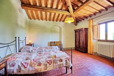 Letto o letti in una camera di Casa Scopeti by PosarelliVillas