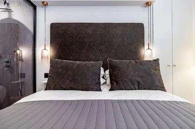 Letto o letti in una camera di Suite Nobellina Florence