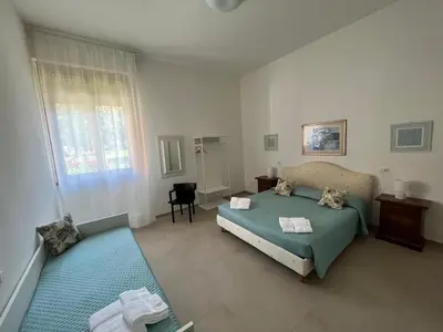 Letto o letti in una camera di Casa Cloe
